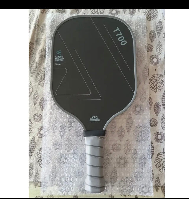 Pickleball Paddle T700 Carbon fiber charged surface technology for Increased Power Feel Fully Encased  Sweet Spot USAPA Approved

Includes : 1 pickle ball paddle