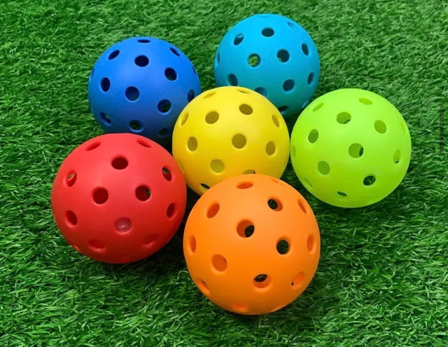 6 Pack Outdoor Pickleball Balls Set. Standard 40 Holes Ball Multicolor USAPA Standard 

made from high-quality plastic. exceptional seam welding offers greater durability and resists splitting 40 small precisely holes to minimize wind interference and cre