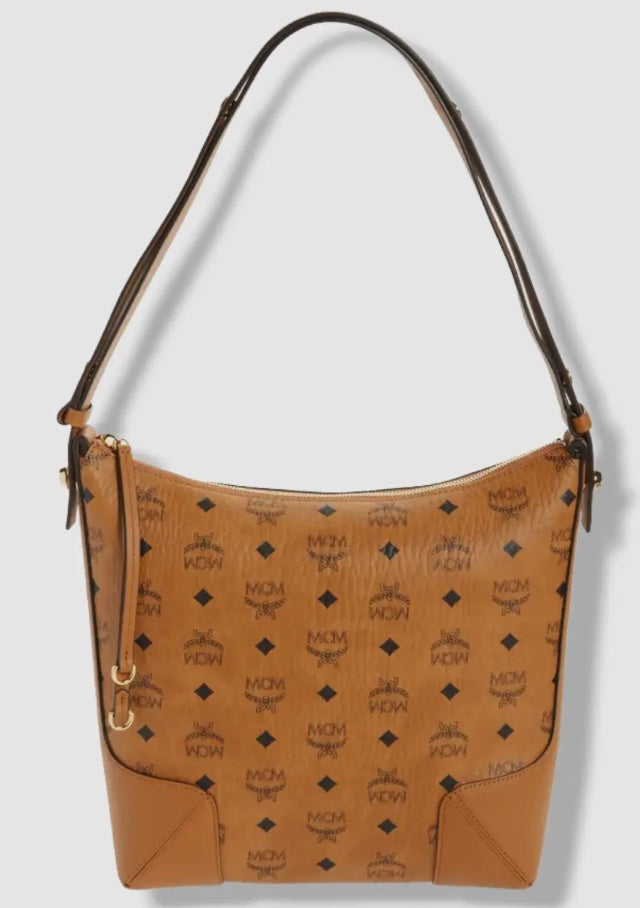 MCM Women's Brown Klara Monogram Medium Visetos Leather Shoulder Hand Hobo Bag

SIZE
10"W x 11.5"H x 4"D

Description
Signature monogram logo and tassel trim enhances this chic hobo bag.
Adjustable crossbody strap
Top zip
Tassel trim
24K gold hardware
1 i