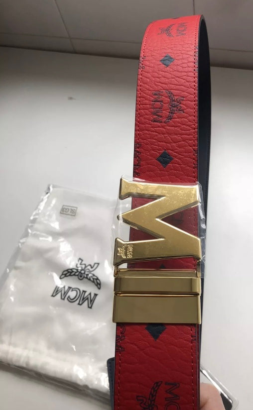 MCM Brand Visetos Red Black Reversible Belt Gold Faux Leather New 

A polished logo buckle secures this reversible belt featuring textured faux-leather on one side and the brand's signature Visetos-print on the other.

• 1 3/4" belt width; 2" x 2 1/4" buc