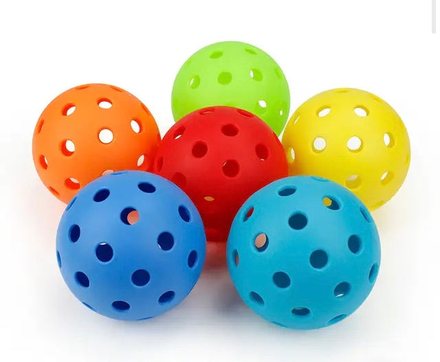 6 Pack Outdoor Pickleball Balls Set. Standard 40 Holes Ball Multicolor USAPA Standard 

made from high-quality plastic. exceptional seam welding offers greater durability and resists splitting 40 small precisely holes to minimize wind interference and cre