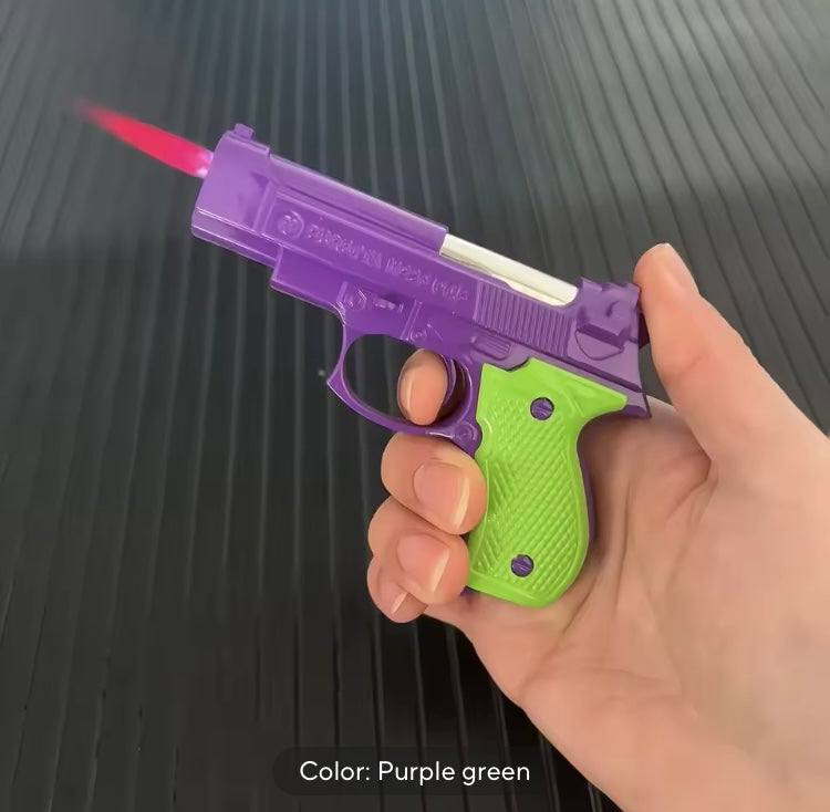 Cool Pistol Style Handgun Firearm Toy Lighter Jet turbo butane Gas Lighter Windproof Cigar Lighter 

Comes in 5 different colors 
1) purple green 
2) blue white 
3) pink white 
4) pink blue 
5) red black 

Let us know about your choice of color at the tim